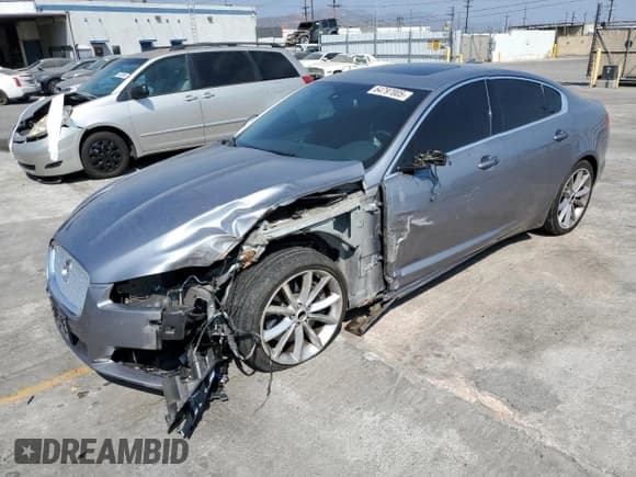 ✅ 2015 Jaguar XF Portfolio • VIN: SAJWA0F7XF8U64954 • Lot: 64797005. Listed on Copart with 71,540 mi. Free auction sales archive from the USA and detailed vehicle history report at DreamBid. Image 1.