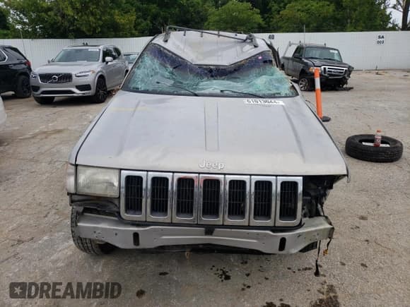 ✅ 1996 Jeep Grand Cherokee Laredo • VIN: 1J4GZ58S2TC401845 • Лот: 61013044. Опубликован ранее на Copart с пробегом Не указан. Бесплатный доступ к архиву аукционных продаж из США и подробный отчёт об истории автомобиля на DreamBid. Изображение 5.