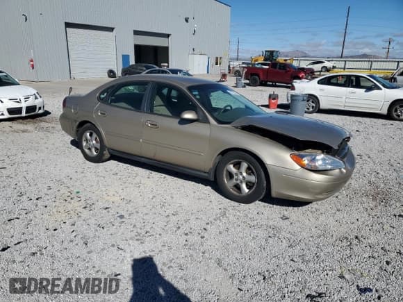 ✅ 2001 Ford Taurus SE • VIN: 1FAFP53U71G120927 • Lot: 82772305. Listed on Copart with 192,116 mi. Free auction sales archive from the USA and detailed vehicle history report at DreamBid. Image 4.