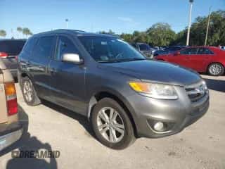 2012 Hyundai Santa Fe Limited z VIN 5XYZK4AG1CG144109, wystawiony jako Copart lot #74305014 z przebiegiem Nie podano mil oraz Nie do naprawy • Non repairable. Historia ofert i sprzedaży dostępna na DreamBid. Obrazek 4.