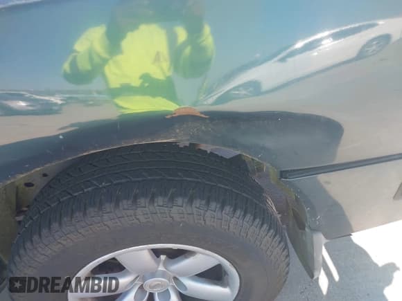 ✅ 2005 Nissan Titan XE • VIN: 1N6BA07AX5N563374 • Lot: 43627413. Listed on IAAI with 151,817 mi. Free auction sales archive from the USA and detailed vehicle history report at DreamBid. Image 6.