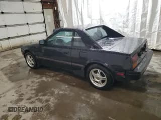 ✅ 1986 Toyota MR2 • VIN: JT2AW15C6G0076546 • Lot: 73481234. Wystawiony na Copart z przebiegiem 148 909 mil. Bezpłatny archiwum sprzedaży aukcyjnych z USA i szczegółowy raport historii pojazdu na DreamBid. Zdjęcie 2.