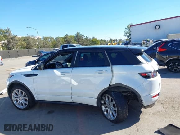 ✅ 2014 Land Rover Range Rover Evoque Dynamic • VIN: SALVT2BG7EH860711 • Lot: 43353085. Listed on IAAI with 124,153 mi. Free auction sales archive from the USA and detailed vehicle history report at DreamBid. Image 14.