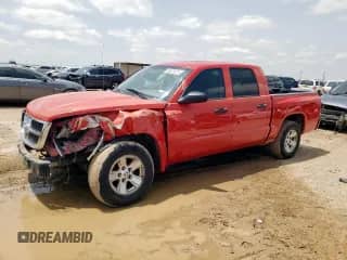 2008 Dodge Dakota SLT z VIN 1D7HE48K78S532224, wystawiony jako Copart lot #58579875 z przebiegiem 140 457 mil mil oraz Szkoda całkowita • Salvage title. Historia ofert i sprzedaży dostępna na DreamBid. Obrazek 1.