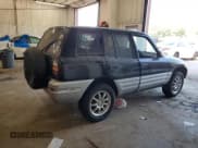 ✅ 2000 Toyota RAV4 • VIN: JT3HP10V4Y0232794 • Lot: 84278185. Listed on Copart with 243,884 mi. Free auction sales archive from the USA and detailed vehicle history report at DreamBid. Image 3.