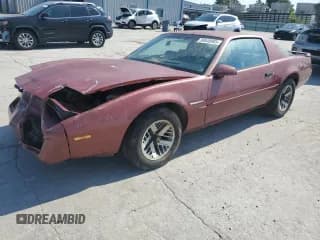 ✅ 1989 Pontiac Firebird • VIN: 0K0980680704 • Лот: 58840065. Опубликован ранее на Copart с пробегом 237 387 миль. Бесплатный доступ к архиву аукционных продаж из США и подробный отчёт об истории автомобиля на DreamBid. Изображение 1.