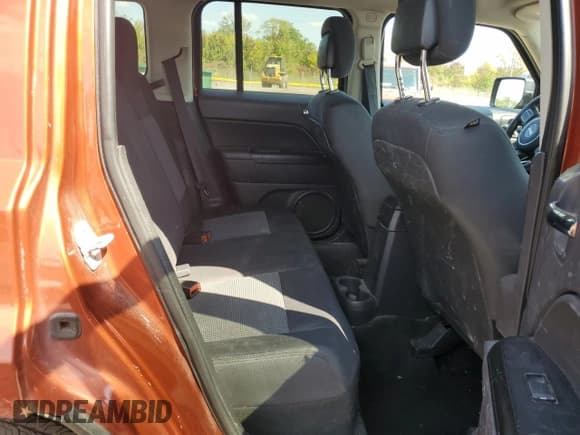 ✅ 2012 Jeep Patriot Sport • VIN: 1C4NJPBA0CD639266 • Lot: 80720025. Listed on Copart with 124,114 mi. Free auction sales archive from the USA and detailed vehicle history report at DreamBid. Image 11.