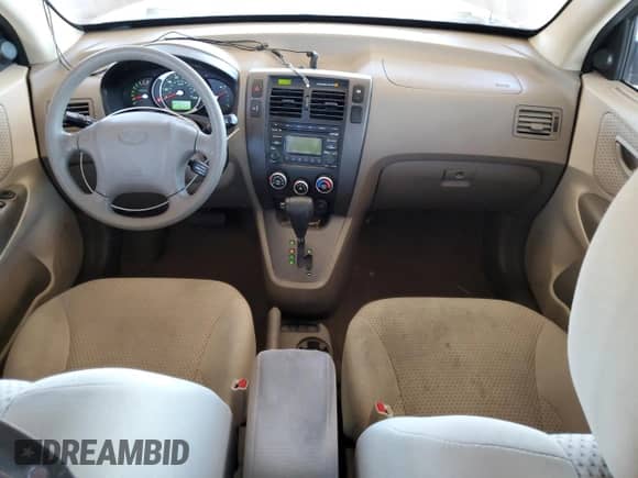 2009 Hyundai Tucson GLS z VIN KM8JM12B99U007530, wystawiony jako Copart lot #80702514 z przebiegiem 56 675 mil mil oraz Szkoda całkowita • Salvage title. Historia ofert i sprzedaży dostępna na DreamBid. Obrazek 8.