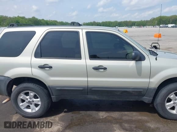 ✅ 2006 Ford Escape XLT • VIN: 1FMYU93Z46KA86718 • Лот: 42155834. Опубликован ранее на IAAI с пробегом 143 696 миль. Бесплатный доступ к архиву аукционных продаж из США и подробный отчёт об истории автомобиля на DreamBid. Изображение 13.
