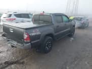 ✅ 2015 Toyota Tacoma • VIN: 3TMLU4EN7FM201302 • Lot: 41666606. Listed on IAAI with 200,504 mi. Free auction sales archive from the USA and detailed vehicle history report at DreamBid. Image 4.