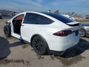 ✅ 2022 Tesla Model X Plaid • VIN: 7SAXCBE63NF337529 • Lot: 42066904. Wystawiony na IAAI z przebiegiem 56 933 mil. Bezpłatny archiwum sprzedaży aukcyjnych z USA i szczegółowy raport historii pojazdu na DreamBid. Zdjęcie 3.