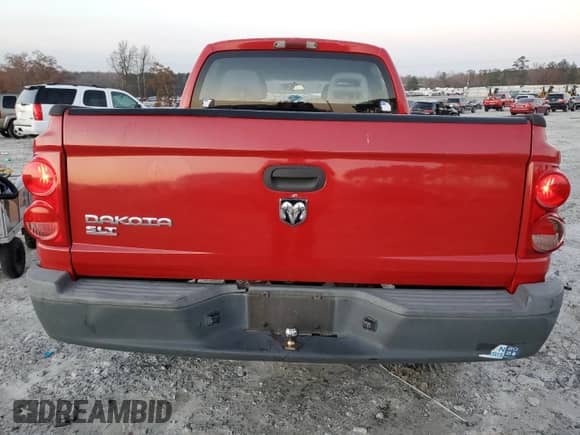 2006 Dodge Dakota SLT с VIN 1D7HE48K16S687252, выставлен на аукционе Copart как лот 85210814 с пробегом 250 541 миль миль и На запчасти • Non repairable. История ставок и продаж доступна на DreamBid. Изображение 6.