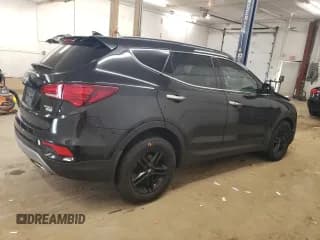 ✅ 2018 Hyundai Santa Fe 2.4L • VIN: 5NMZUDLB8JH056947 • Лот: 57129824. Опубликован ранее на Copart с пробегом 85 007 миль. Бесплатный доступ к архиву аукционных продаж из США и подробный отчёт об истории автомобиля на DreamBid. Изображение 3.