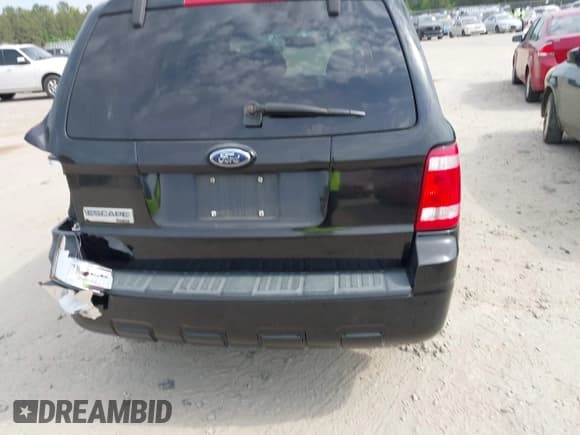 ✅ 2008 Ford Escape Limited • VIN: 1FMCU04178KE77007 • Lot: 42078654. Listed on IAAI with 233,168 mi. Free auction sales archive from the USA and detailed vehicle history report at DreamBid. Image 16.