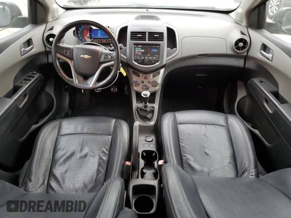 2013 Chevrolet Sonic LTZ с VIN 1G1JF6SB5D4152982, выставлен на аукционе Copart как лот 70643904 с пробегом 144 912 миль миль и Списание • Salvage title. История ставок и продаж доступна на DreamBid. Изображение 8.