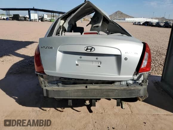 2011 Hyundai Accent GLS z VIN KMHCN4AC5BU607095, wystawiony jako Copart lot #75853554 z przebiegiem 212 818 mil mil oraz Szkoda całkowita • Salvage title. Historia ofert i sprzedaży dostępna na DreamBid. Obrazek 6.