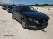 ✅ 2023 Mazda CX-30 S Premium • VIN: 3MVDMBDM4PM546563 • Lot: 67591215. Listed on Copart with 10,757 mi. Free auction sales archive from the USA and detailed vehicle history report at DreamBid. Image 14.