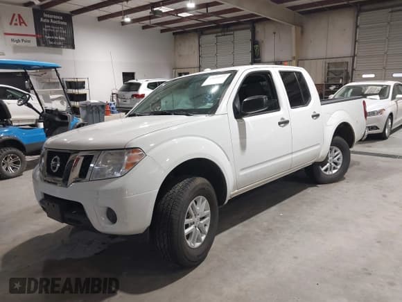 ✅ 2016 Nissan Frontier SV • VIN: 1N6AD0EV5GN788894 • Lot: 43694577. Listed on IAAI with 143,822 mi. Free auction sales archive from the USA and detailed vehicle history report at DreamBid. Image 2.