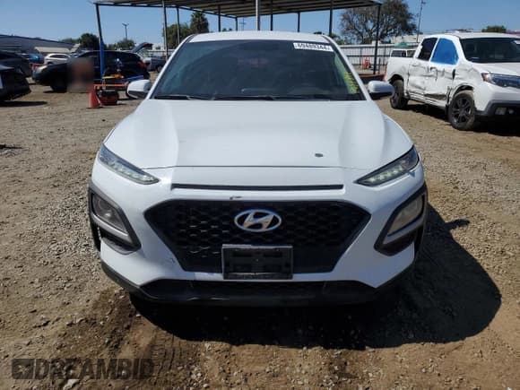 ✅ 2018 Hyundai Kona SE • VIN: KM8K12AA3JU091053 • Лот: 69489344. Опубликован ранее на Copart с пробегом 104 582 миль. Бесплатный доступ к архиву аукционных продаж из США и подробный отчёт об истории автомобиля на DreamBid. Изображение 5.