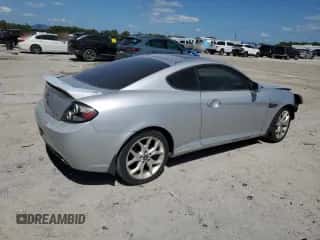 2008 Hyundai Tiburon GT с VIN KMHHN66F88U284030, выставлен на аукционе Copart как лот 53251315 с пробегом Не указан миль и Списание • Salvage title. История ставок и продаж доступна на DreamBid. Изображение 3.