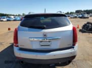 ✅ 2013 Cadillac SRX Premium Collection • VIN: 3GYFNEE31DS524701 • Lot: 84372895. Wystawiony na Copart z przebiegiem 207 688 mil. Bezpłatny archiwum sprzedaży aukcyjnych z USA i szczegółowy raport historii pojazdu na DreamBid. Zdjęcie 6.