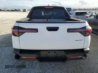 2022 Hyundai Santa Cruz SEL Premium z VIN 5NTJDDAF8NH037411, wystawiony jako Copart lot #75353154 z przebiegiem 9 656 mil mil oraz Nie do naprawy • Non repairable. Historia ofert i sprzedaży dostępna na DreamBid. Obrazek 6.