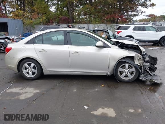 ✅ 2013 Chevrolet Cruze 1LT • VIN: 1G1PC5SBXD7147918 • Lot: 43573003. Listed on IAAI with 79,414 mi. Free auction sales archive from the USA and detailed vehicle history report at DreamBid. Image 14.