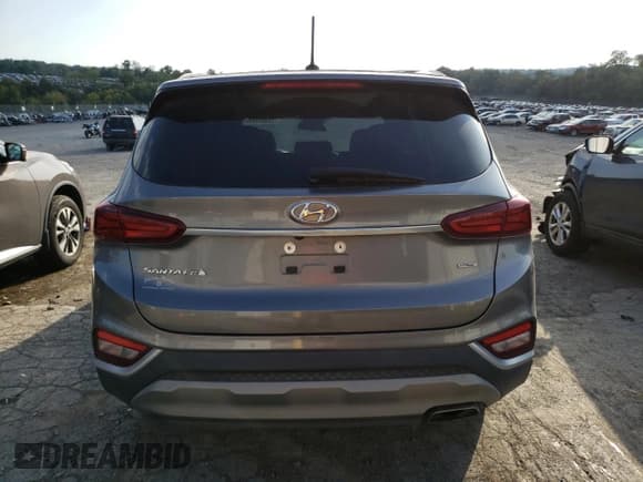 ✅ 2019 Hyundai Santa Fe SE • VIN: 5NMS2CAD0KH128019 • Lot: 70981433. Wystawiony na Copart z przebiegiem 50 255 mil. Bezpłatny archiwum sprzedaży aukcyjnych z USA i szczegółowy raport historii pojazdu na DreamBid. Zdjęcie 6.