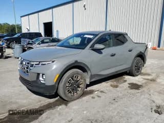 ✅ 2022 Hyundai Santa Cruz SEL • VIN: 5NTJB4AE4NH024362 • Лот: 82787105. Опубликован ранее на Copart с пробегом 18 051 миль. Бесплатный доступ к архиву аукционных продаж из США и подробный отчёт об истории автомобиля на DreamBid. Изображение 1.