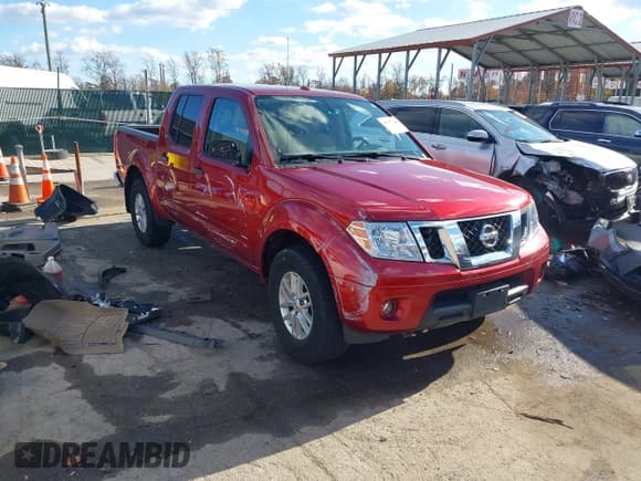✅ 2014 Nissan Frontier Pro-4X • VIN: 1N6AD0EV6EN719239 • Lot: 43665704. Listed on IAAI with 132,038 mi. Free auction sales archive from the USA and detailed vehicle history report at DreamBid. Image 1.