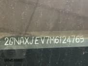 ✅ 2021 Chevrolet Equinox LT • VIN: 2GNAXJEV7M6124765 • Лот: 42432206. Опубликован ранее на IAAI с пробегом 67 186 миль. Бесплатный доступ к архиву аукционных продаж из США и подробный отчёт об истории автомобиля на DreamBid. Изображение 1.