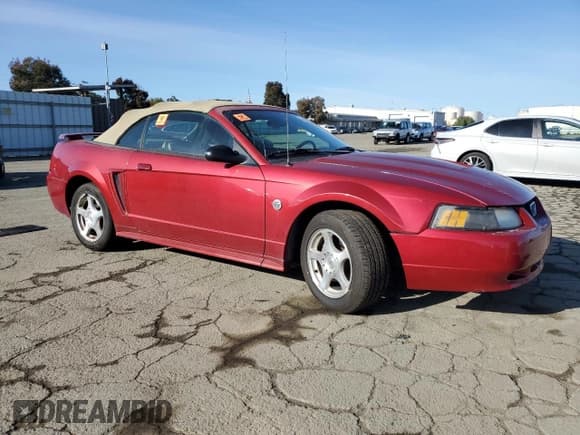 ✅ 2004 Ford Mustang Deluxe • VIN: 1FAFP44604F242565 • Lot: 49583155. Listed on Copart with Not provided. Free auction sales archive from the USA and detailed vehicle history report at DreamBid. Image 4.