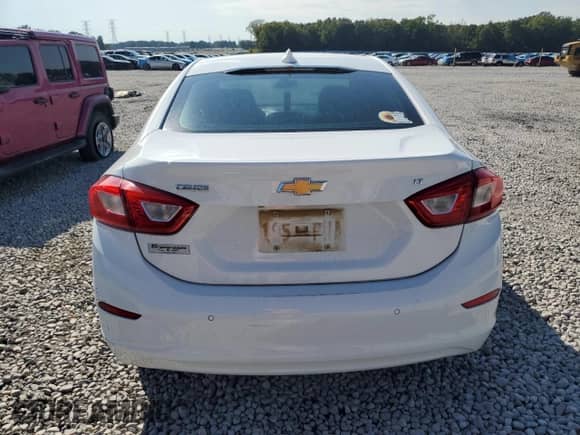 2018 Chevrolet Cruze LT с VIN 1G1BE5SM5J7174736, выставлен на аукционе Copart как лот 81293025 с пробегом 140 114 миль миль и Списание • Salvage title. История ставок и продаж доступна на DreamBid. Изображение 6.