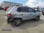 2005 Hyundai Tucson GL with VIN KM8JM12B95U080391, listed as a Copart auction lot 72551384 with 238,122 mi miles and Salvage title. Bid and sale history available at DreamBid. Image 3.