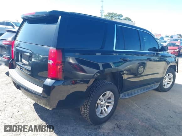 2016 Chevrolet Tahoe Commercial with VIN 1GNSKFEC0GR271243, listed as a IAAI auction lot 41744341 with 189,878 mi miles and . Bid and sale history available at DreamBid. Image 4.