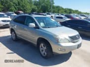 ✅ 2007 Lexus RX 350 • VIN: 2T2HK31UX7C024222 • Lot: 42245924. Listed on IAAI with 228,442 mi. Free auction sales archive from the USA and detailed vehicle history report at DreamBid. Image 1.