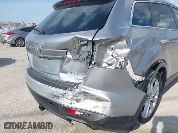 ✅ 2011 Mazda CX-9 Grand Touring • VIN: JM3TB2DA4B0302911 • Lot: 43788397. Wystawiony na IAAI z przebiegiem 202 604 mil. Bezpłatny archiwum sprzedaży aukcyjnych z USA i szczegółowy raport historii pojazdu na DreamBid. Zdjęcie 6.