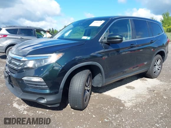 ✅ 2017 Honda Pilot EX-L • VIN: 5FNYF6H59HB091514 • Lot: 43083784. Listed on IAAI with 97,606 mi. Free auction sales archive from the USA and detailed vehicle history report at DreamBid. Image 18.