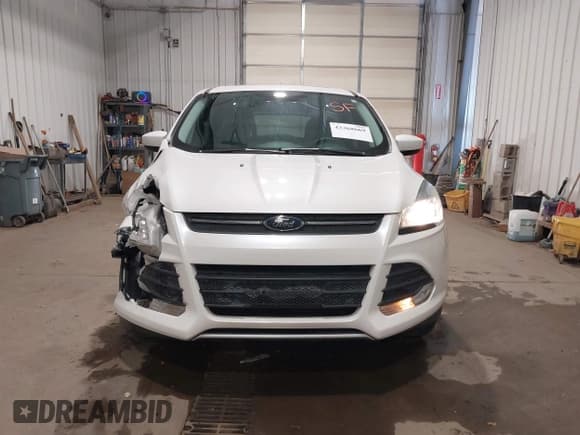 ✅ 2016 Ford Escape SE • VIN: 1FMCU9GX9GUA99036 • Lot: 43368669. Listed on IAAI with 92,093 mi. Free auction sales archive from the USA and detailed vehicle history report at DreamBid. Image 12.