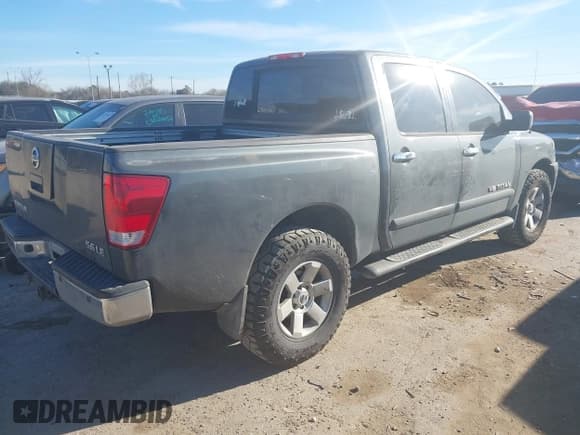 ✅ 2005 Nissan Titan LE • VIN: 1N6AA07B65N501054 • Lot: 41728466. Listed on IAAI with 318,859 mi. Free auction sales archive from the USA and detailed vehicle history report at DreamBid. Image 4.