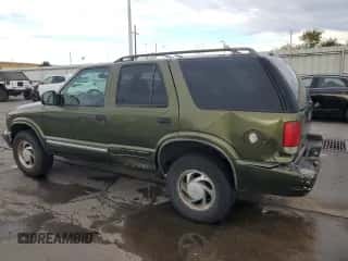 2001 Chevrolet Blazer LT z VIN 1GNDT13W21K240291, wystawiony jako Copart lot #76192674 z przebiegiem 227 111 mil mil oraz Szkoda całkowita • Salvage title. Historia ofert i sprzedaży dostępna na DreamBid. Obrazek 2.