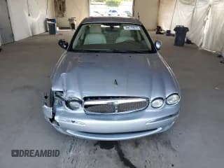 ✅ 2006 Jaguar X-Type • VIN: SAJWA51A16WE97999 • Lot: 69119575. Wystawiony na Copart z przebiegiem 66 585 mil. Bezpłatny archiwum sprzedaży aukcyjnych z USA i szczegółowy raport historii pojazdu na DreamBid. Zdjęcie 5.
