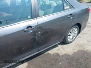 ✅ 2014 Toyota Camry L • VIN: 4T1BF1FK3EU461579 • Lot: 42824178. Listed on IAAI with 167,281 mi. Free auction sales archive from the USA and detailed vehicle history report at DreamBid. Image 6.