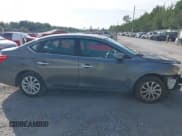 ✅ 2019 Nissan Sentra S • VIN: 3N1AB7AP6KY374806 • Лот: 43787364. Опубликован ранее на IAAI с пробегом 126 182 миль. Бесплатный доступ к архиву аукционных продаж из США и подробный отчёт об истории автомобиля на DreamBid. Изображение 14.