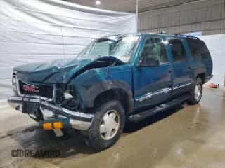 ✅ 1999 GMC Suburban • VIN: 1GKFK16R8XJ793024 • Lot: 51833205. Listed on Copart with 250,410 mi. Free auction sales archive from the USA and detailed vehicle history report at DreamBid. Image 1.