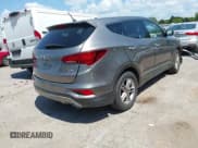 ✅ 2018 Hyundai Santa Fe 2.4L • VIN: 5NMZTDLB4JH107766 • Лот: 43043034. Опубликован ранее на IAAI с пробегом 93 208 миль. Бесплатный доступ к архиву аукционных продаж из США и подробный отчёт об истории автомобиля на DreamBid. Изображение 4.