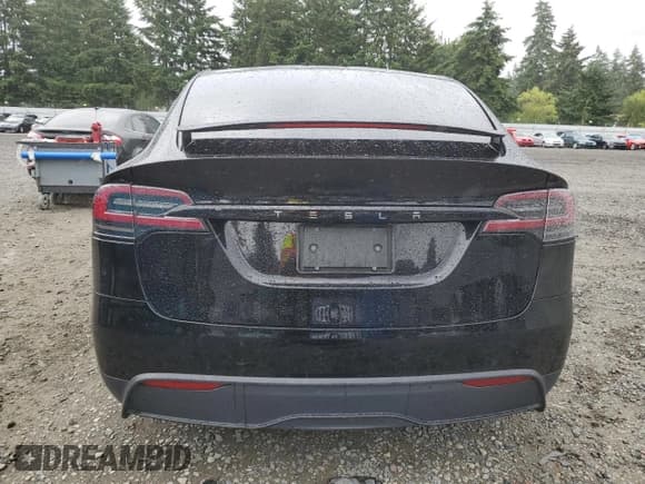 ✅ 2023 Tesla Model X • VIN: 7SAXCDE50PF402844 • Lot: 61633325. Wystawiony na Copart z przebiegiem 46 107 mil. Bezpłatny archiwum sprzedaży aukcyjnych z USA i szczegółowy raport historii pojazdu na DreamBid. Zdjęcie 6.