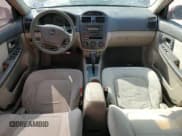 ✅ 2005 Kia Spectra LX • VIN: KNAFE121155079015 • Lot: 89492695. Wystawiony na Copart z przebiegiem 196 820 mil. Bezpłatny archiwum sprzedaży aukcyjnych z USA i szczegółowy raport historii pojazdu na DreamBid. Zdjęcie 8.