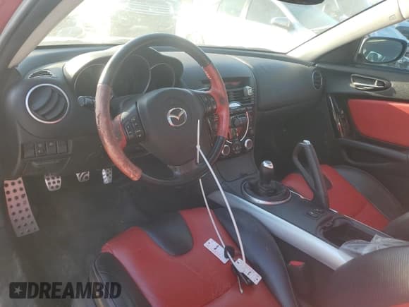 ✅ 2004 Mazda RX-8 • VIN: JM1FE173240134256 • Lot: 74485554. Listed on Copart with 126,992 mi. Free auction sales archive from the USA and detailed vehicle history report at DreamBid. Image 8.