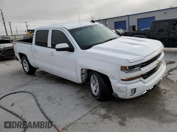 ✅ 2018 Chevrolet Silverado 1500 LT • VIN: 3GCUKREC3JG549983 • Lot: 89824365. Listed on Copart with 74,697 mi. Free auction sales archive from the USA and detailed vehicle history report at DreamBid. Image 4.